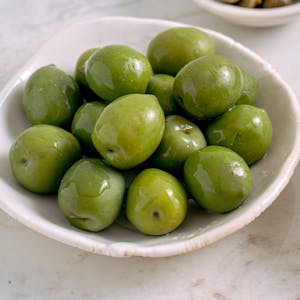 Image featuring olives in a platter in this series of 14 single fruits.